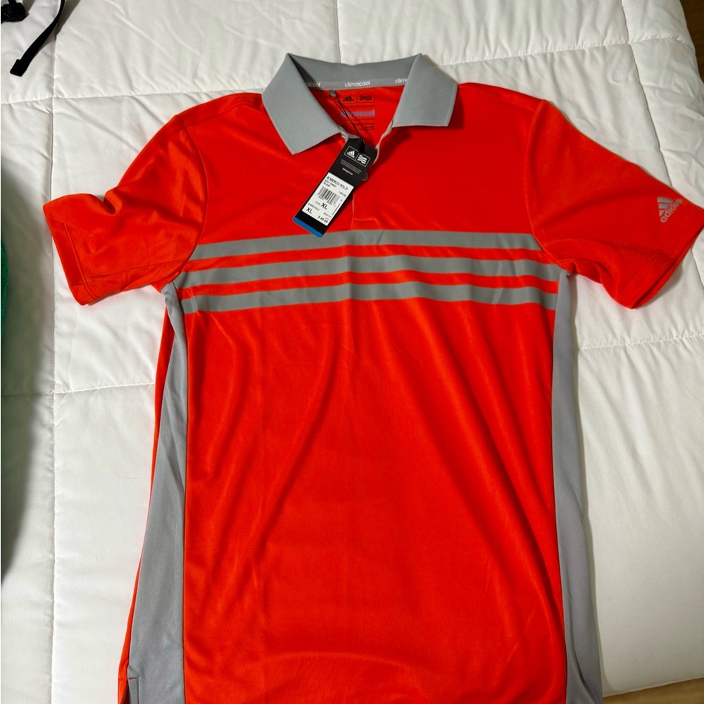 Adidas Youth Vibrant Orange Polo with Gray Stripes